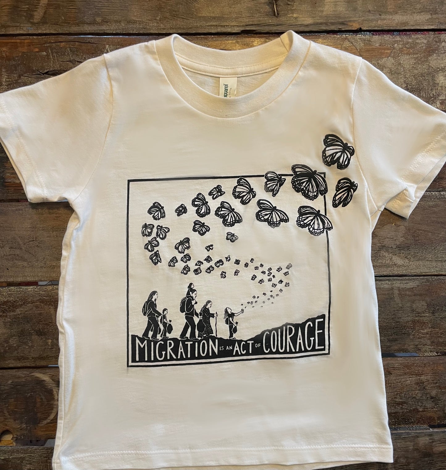 Migration is an Act of Courage Kids T-shirt